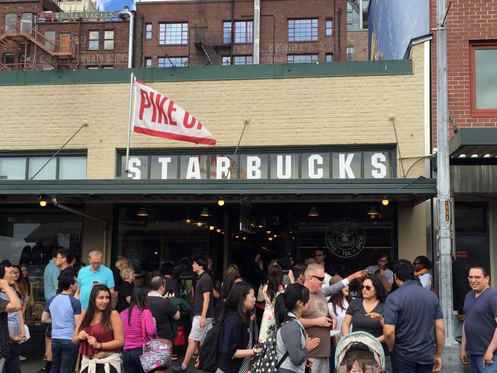 The busy outside of the first Starbucks on Pikes place in Seattle.