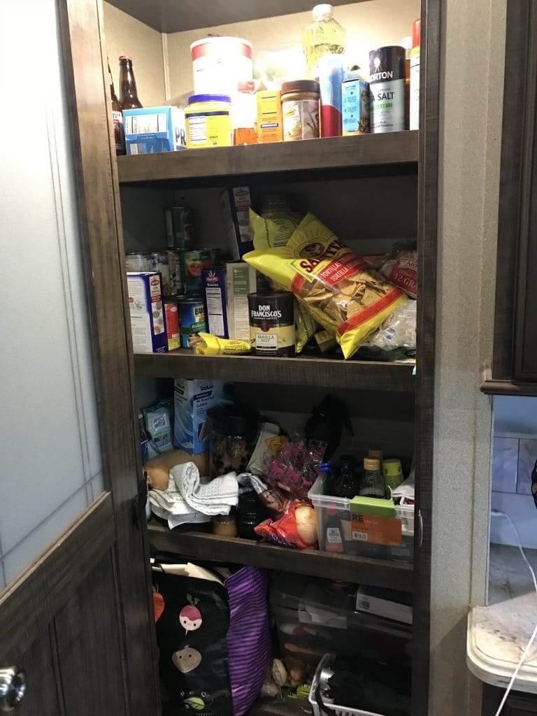 Unorganized pantry before