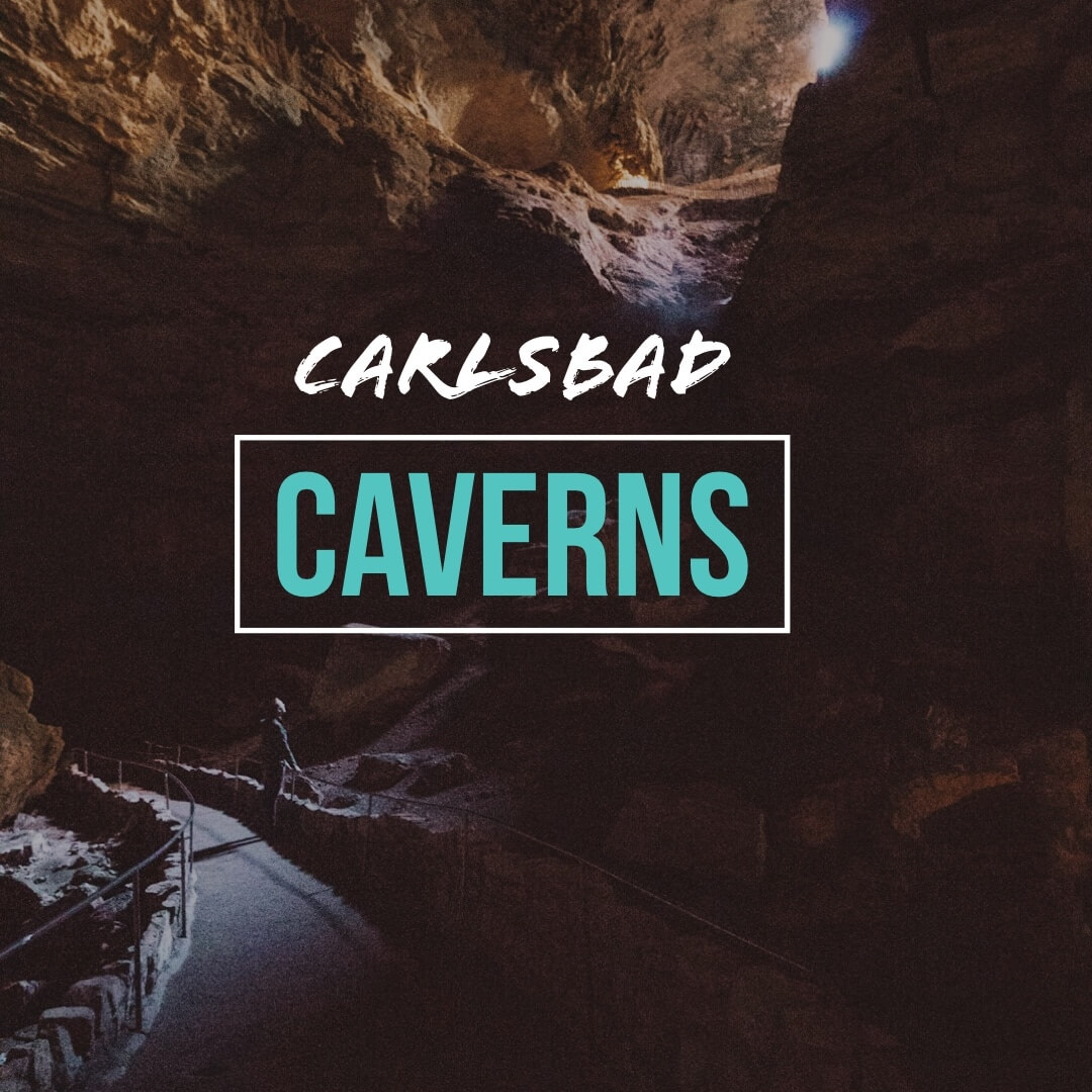 Jason Miller standing at bottom of shaft of light in Carlsbad Caverns