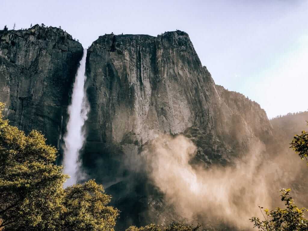 Yosemite Falls flowing with mist at Yosemite National Park.