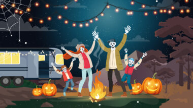 An illustration of a family of skeletons dancing in their campsite