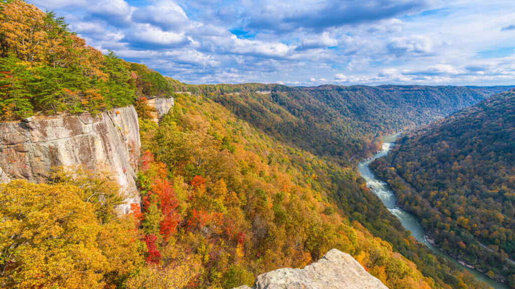 Large rocks perfect for rock climbing jut out over the New River Gorge in the first National Park in West Virginia. 