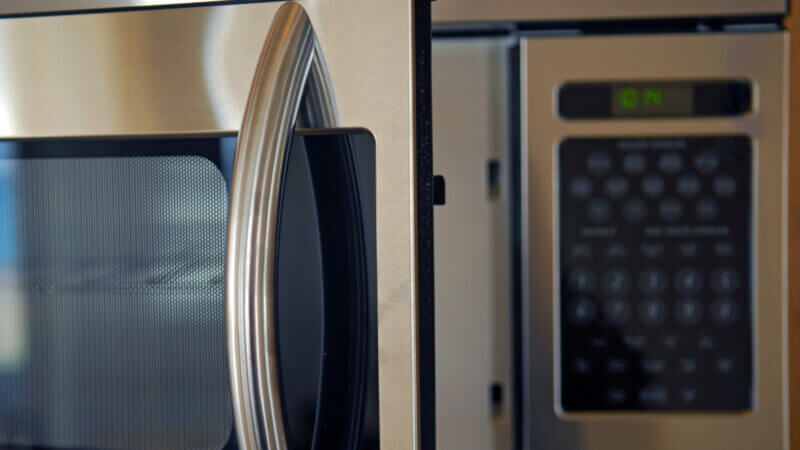 A close up image of an RV microwave convection oven