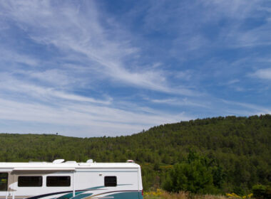 A large RV is ready to boondock in the gorgeous green mountains! Even better if they're prepared with the best boondocking tips for a big rv!