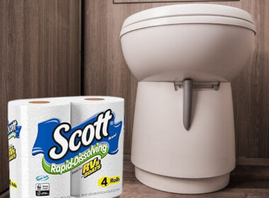 An RV toilet with Scott RV toilet paper alongside it.