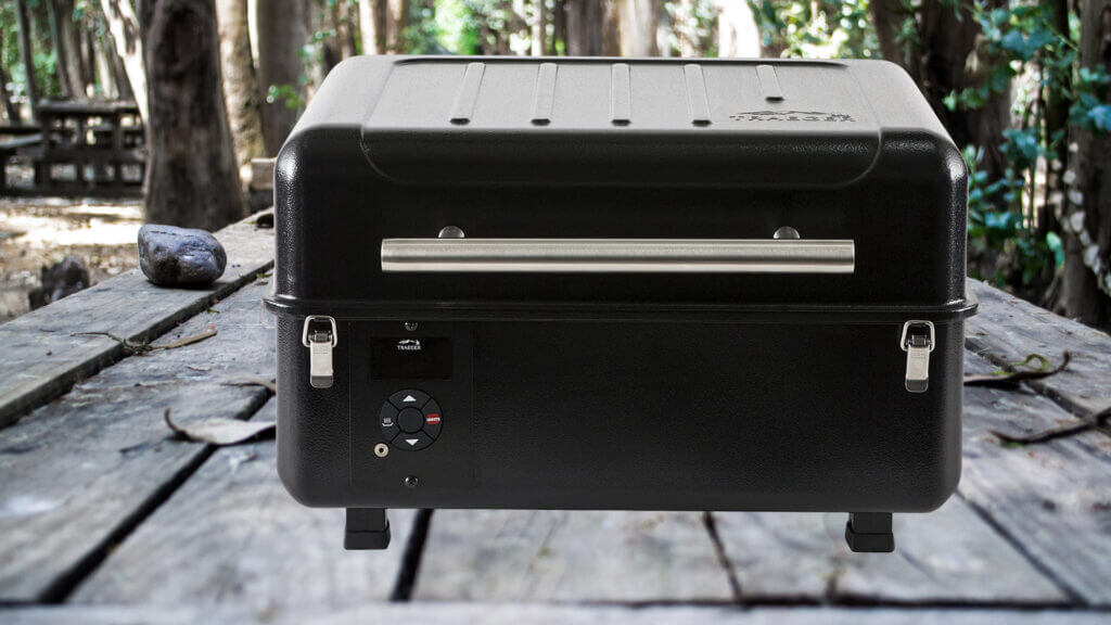 A Traeger Ranger Grill fits perfectly on a camping table.