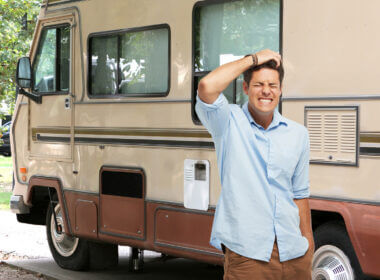 A man stands in front of his RV and feels the pain of his thousand trails membership regrets