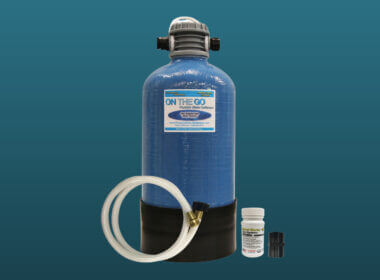 An on the go water softener set against a blue background