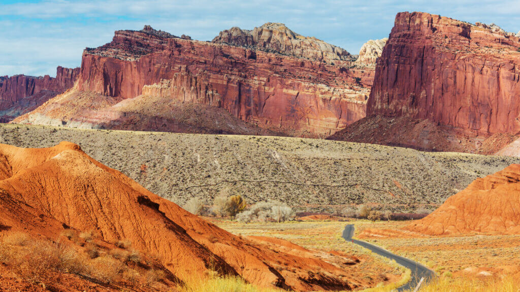 Visit Capitol Reef National Park while on your RV trip to Utah and learn about the history of the land through the geological finds. 