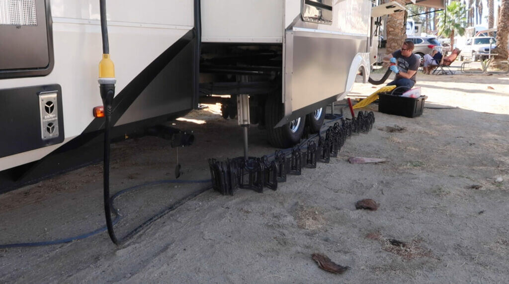 Jason showing you how to hook up your RV when it comes to sewer