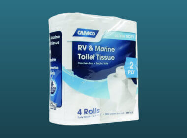 Camco RV toilet paper set against a dark blue background.