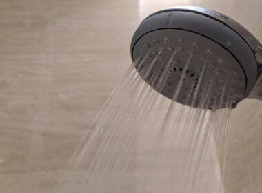 A shower head in an RV relies on a water pump to have steady strong water pressure.