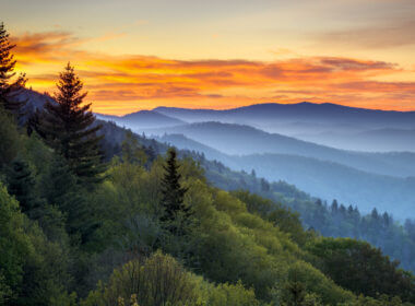 A sunset over the smoky mountains is a gorgeous view you can enjoy on your RV trip there!