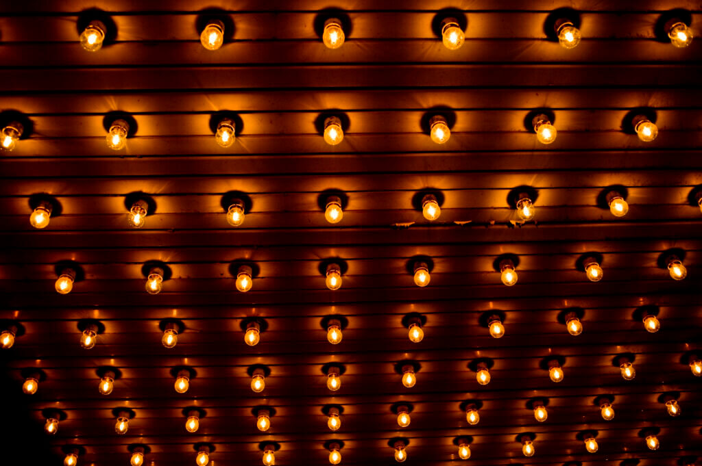 An assortment of lights along a wall.