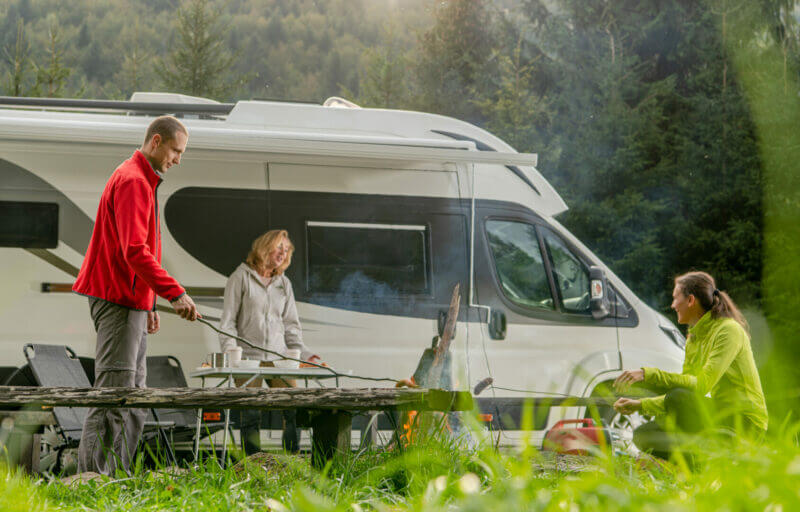 Family camping with their Class C RV.