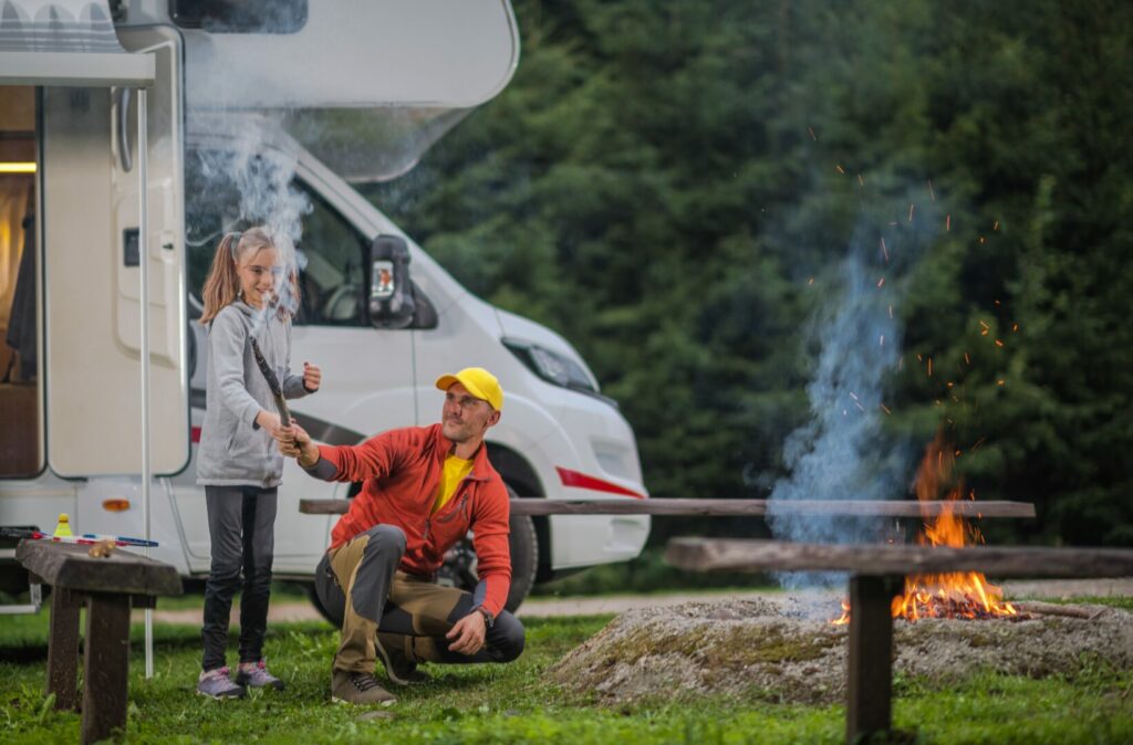 Family enjoying their time camping with their class B motorhome.