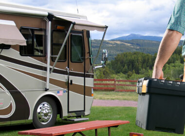 man with his RV tool kit about to work on his RV