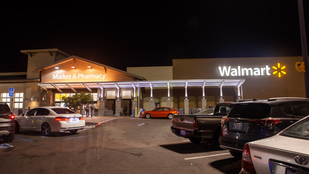 A Walmart parking lot at night where RVs can take advantage of lotdocking.