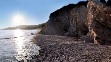 El Capitan beach's rocky shoreline shines in the sun.