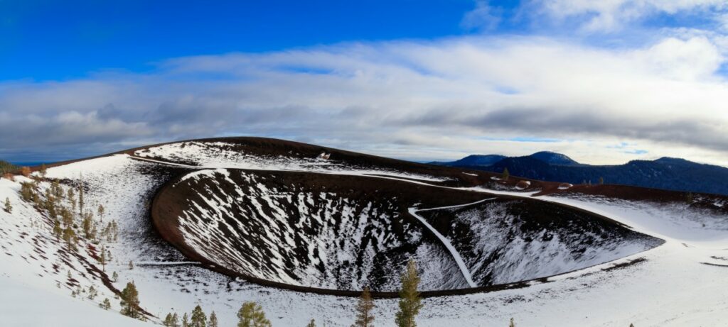 Blue skies and a light dusting of snow at Cindercone at Lassen Volcanic National Park in California.