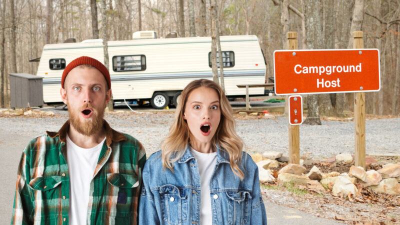 a couple looking shocked in front of a sign that says "campground host"