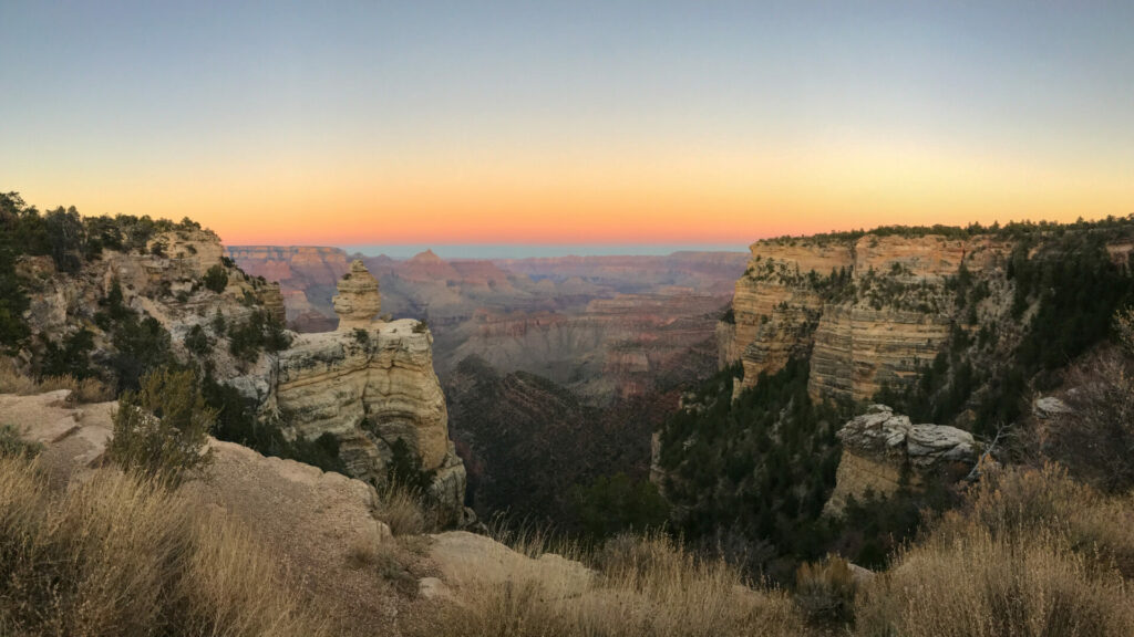 The grand canyon has a colorful sunset that glows especially beautiful in the fall.