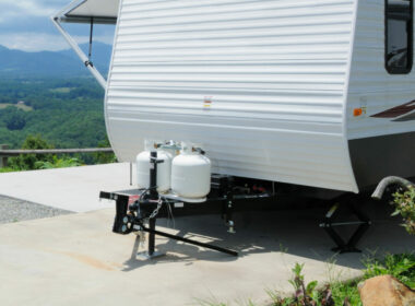 Two propane tanks externally mounted on a travel trailer