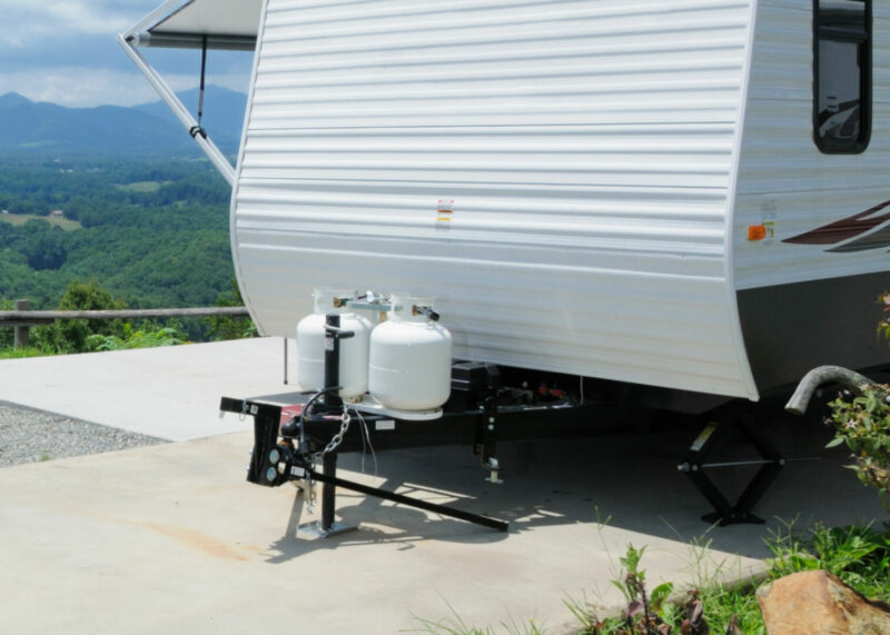 Two propane tanks externally mounted on a travel trailer
