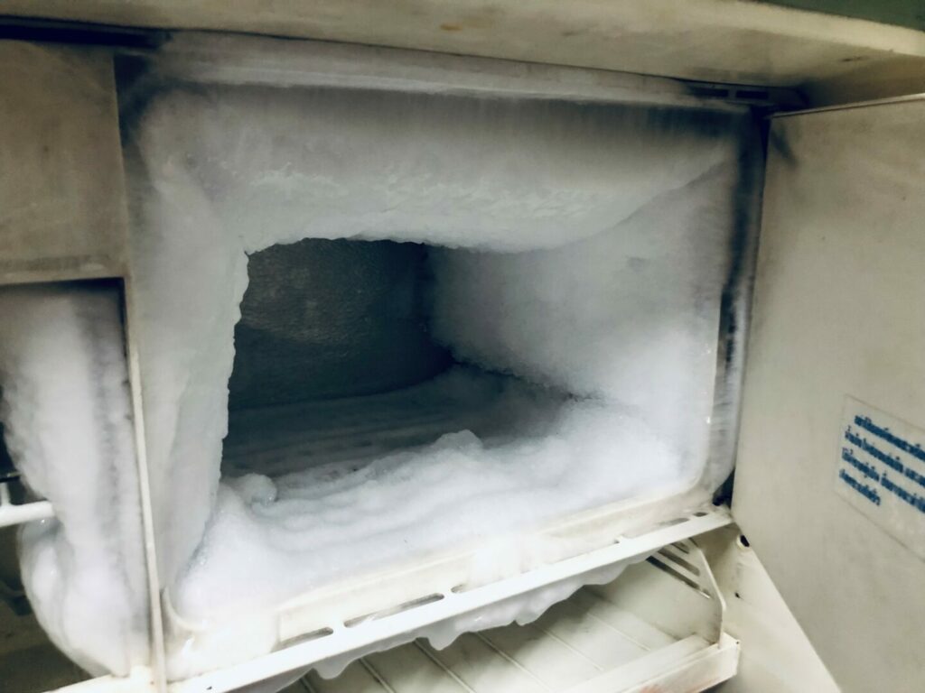 Lots of ice build up in a refrigerator 