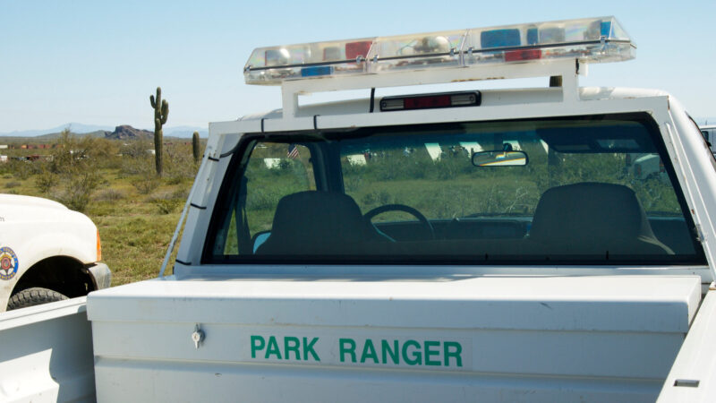 A park ranger truck with sirens that look like cop car sirens on top.