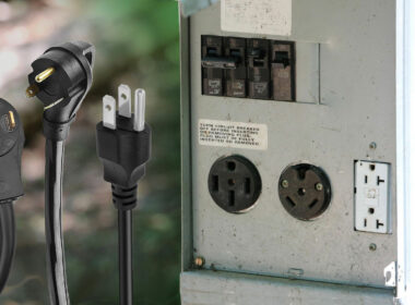 Three types of RV power cords next to an electrical box at a campground with different types of outlets.