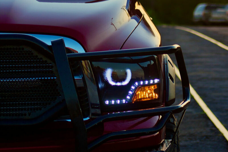 The front headlight and brush guard on a Ram truck