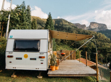 An RV is parked on private land to be used as a permanent living residence rather than living in a traditional home.
