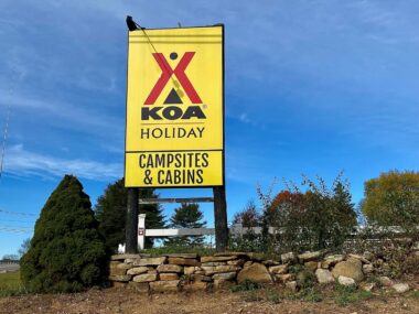 A KOA campground welcome sign, but you can enjoy great perks for joining a KOA membership.