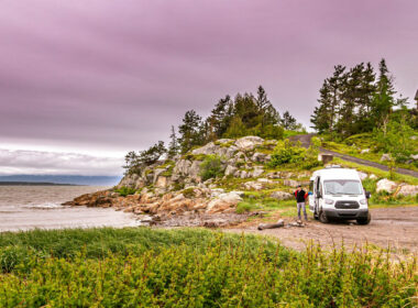 An RV camps down along the ocean front on the Northern Atlantic coast.
