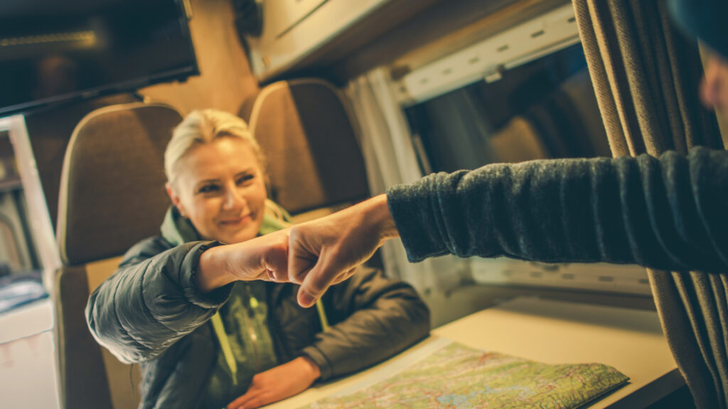 A couple fist bumps because their RV process was smooth and easy thanks to a checklist.