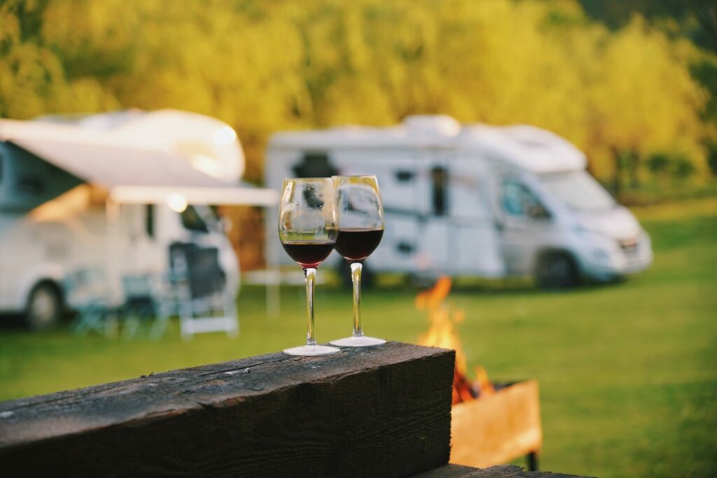 Wine glasses in front of RVs