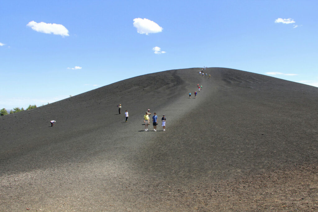 People hiking at Craters of the Moon National Monument