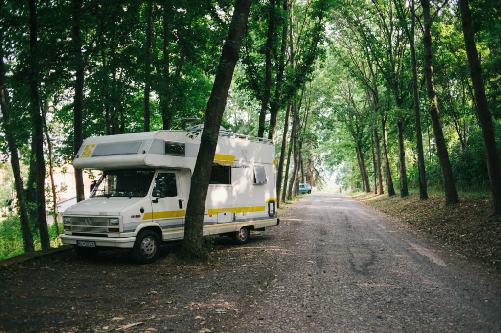 A motorhome boondocking off of a fire road.