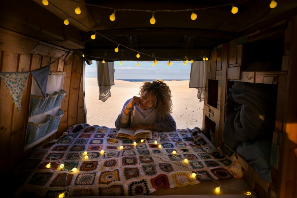 Hanging lights make great camper van decor and add warmth and sparkle to your space.