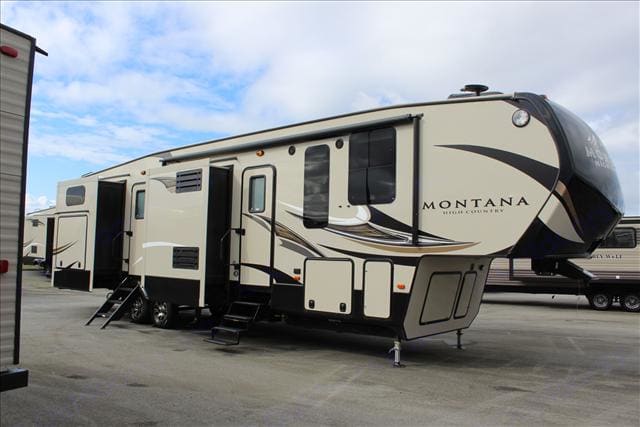 A Montana fifth wheel setup in a campsite