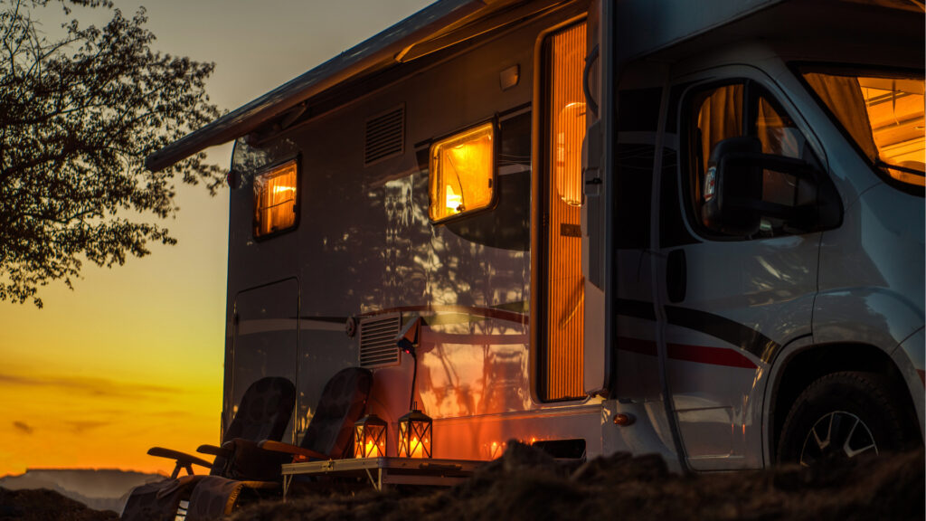 RV parked outside during the sun set, using a quiet generator to maintain a quiet atmosphere. 