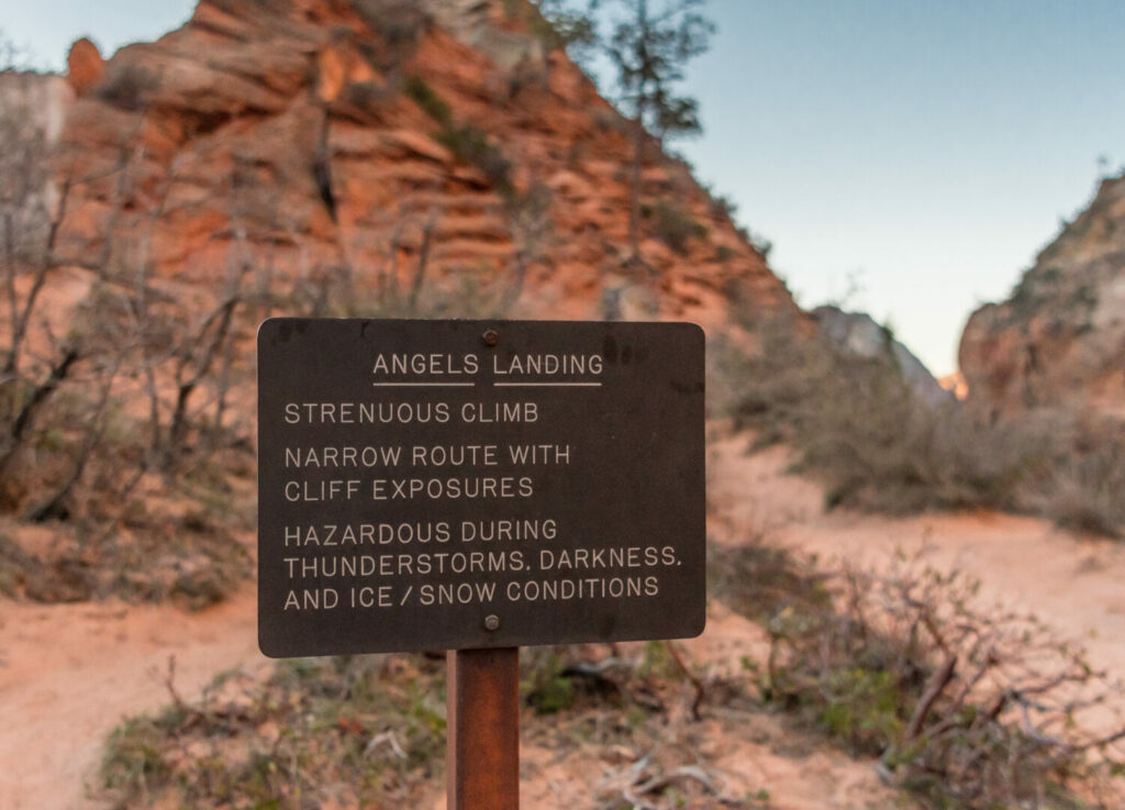 angels landing hike warning sign cautions hikers about risk