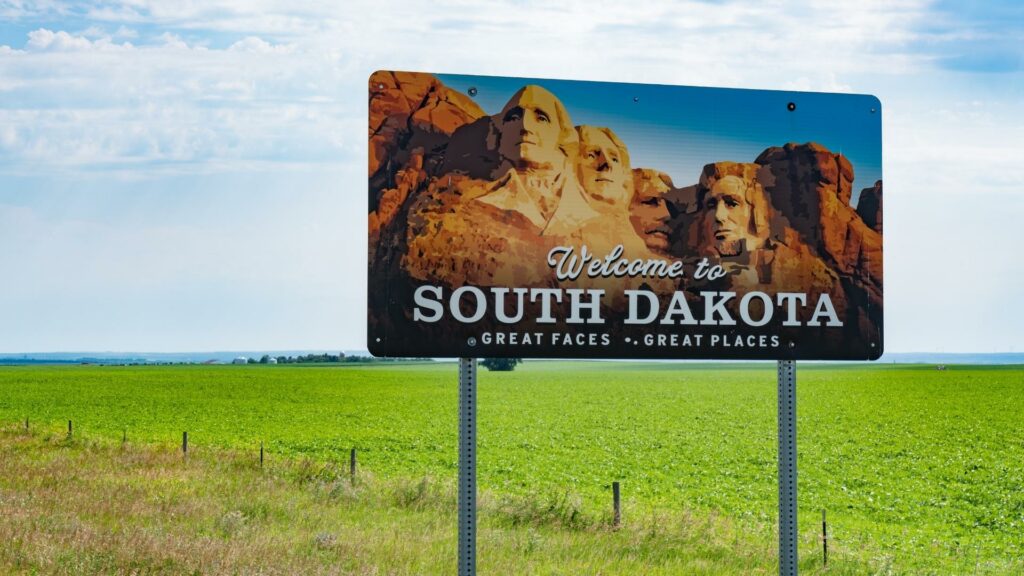 A welcome to South Dakota sign, where many RVers claim as their state of residency 
