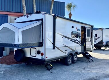 Hybrid camper at an RV show in Florida