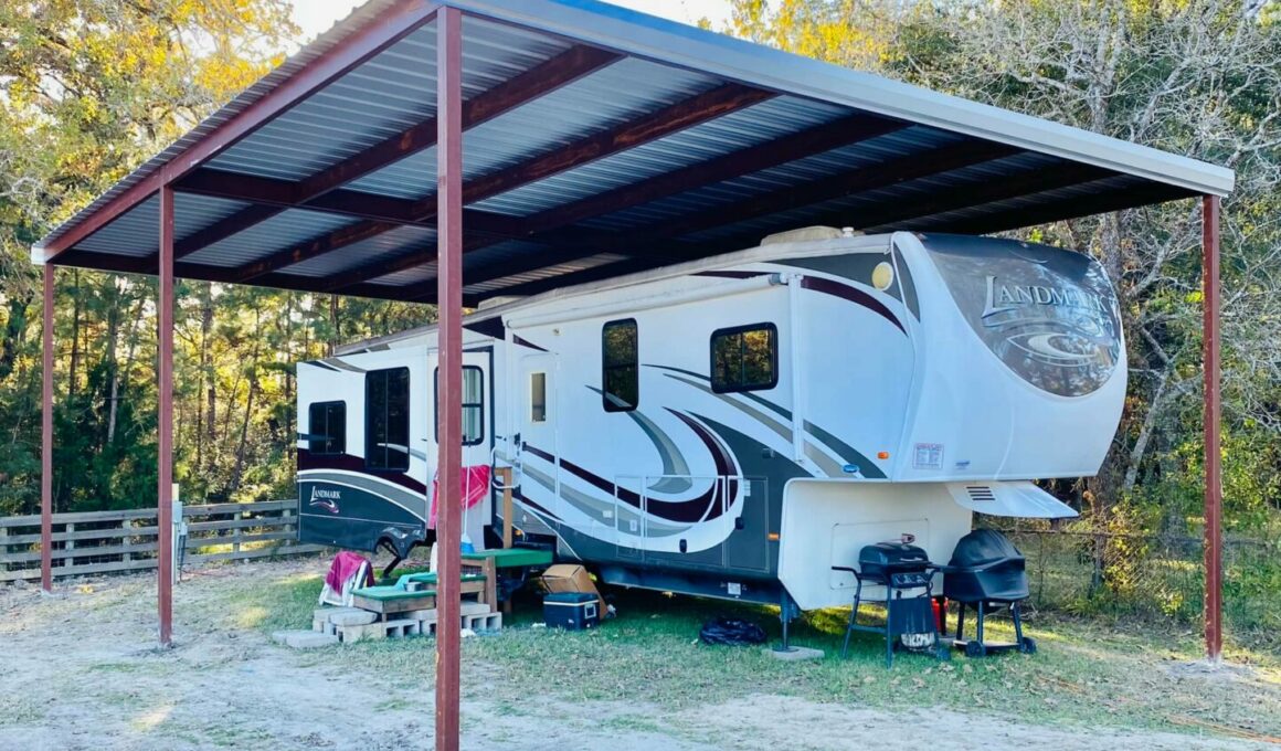 Tall carport installed over a large fifth wheel