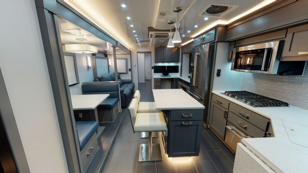 Interior picture showing the kitchen and living room of a SpaceCraft RV