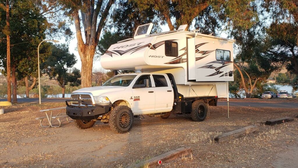 Super Single tires on a ram 4500 truck with a truck camper loaded on it