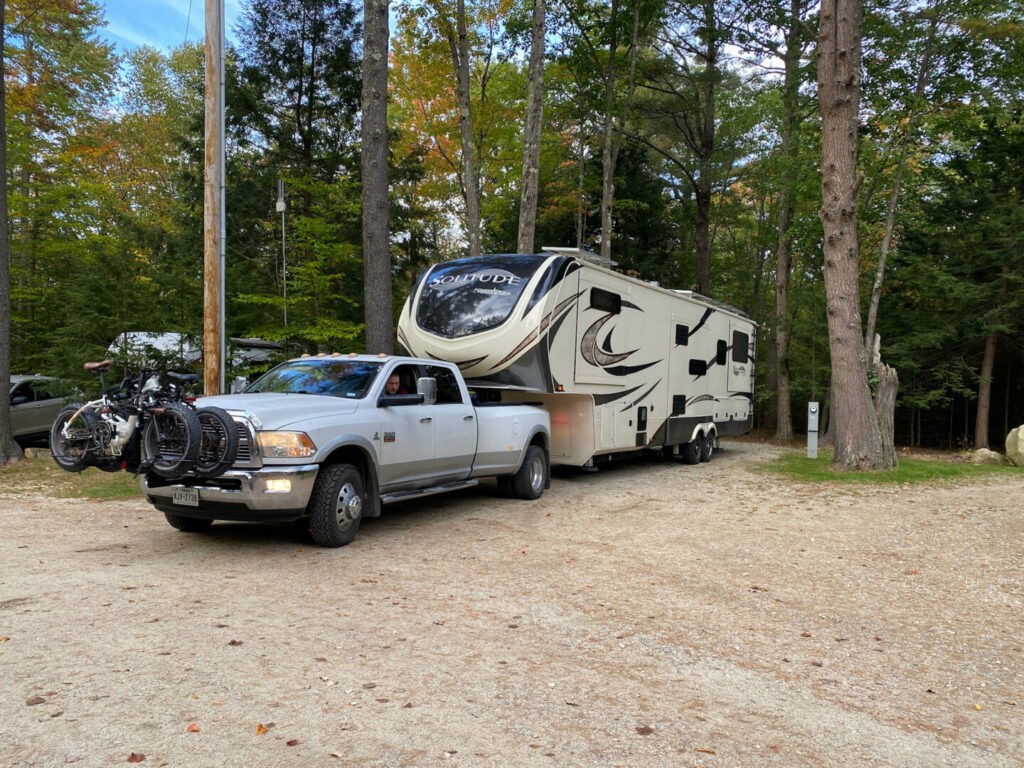 A fifth wheel backing up into a first come first serve camping spot in Virginia 