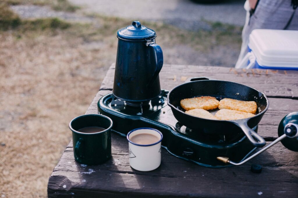 Camping breakfast foods gathered together.